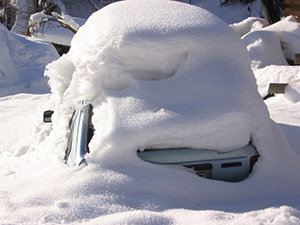 car buried under snow - shutter